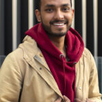 medium-shot-smiley-man-posing-ezgif.com-resize (1)