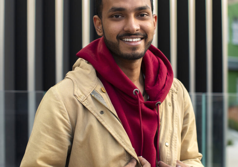 medium-shot-smiley-man-posing-ezgif.com-resize (1)